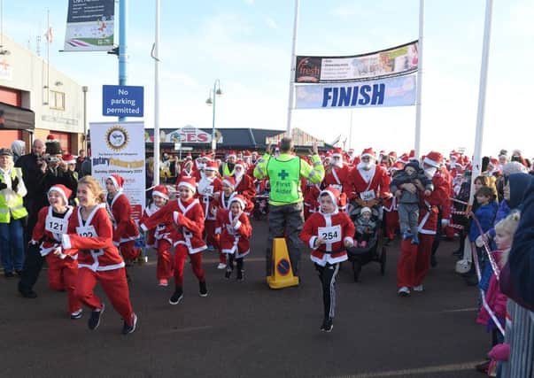 And they're off.... the Skegness Santa  Run. Photo: MSKP-111216-32 ANL-161212-101248001