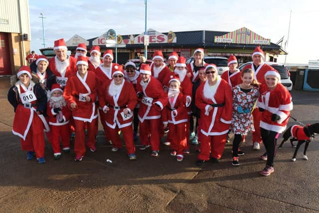 Skegness Coasters running club members get set. for the Santa Run. Photo: MSKP-111216-22 ANL-161212-101201001