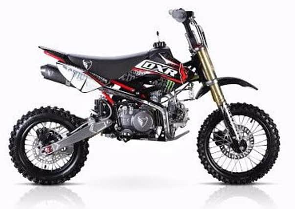 A Demon DXR CRF50 off road pit bike was stolen during a garage burglary at a property in Swineshead.