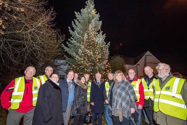 Mayor Coun Bill Aron with Rotary Club officials and other guests at the Tree of Light switch on EMN-161212-122001001