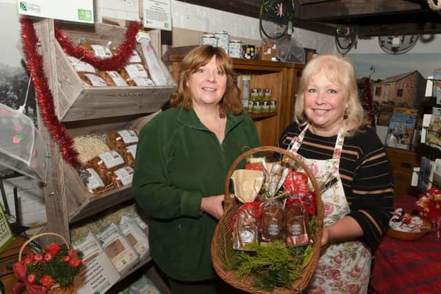 Fruit Loaf making demonstration at Cogglesford Mill, by Sherry Forbes of Manor House Stables. Cogglesford Mill assistant Dawn Oakley with Sherry Forbes. EMN-161212-092344001