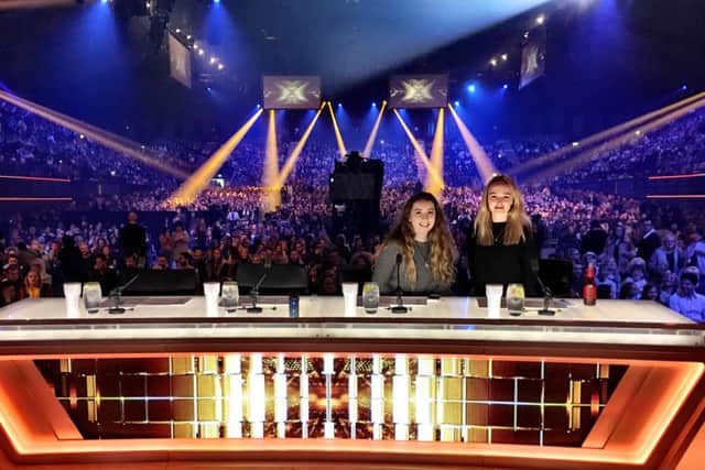 Katie Flaherty, 19, and Emma Hartford, 18, were invited to sit in the judges seats just two minutes before Sundays X Factor final show went live. EMN-161213-123927001