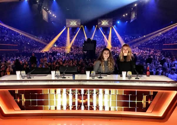 Katie Flaherty, 19, and Emma Hartford, 18, were invited to sit in the judges seats just two minutes before Sundays X Factor final show went live. EMN-161213-123927001