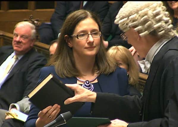 Dr Caroline Johnson swearing the Oath of Allegiance to the Crown in the House of Commons on Monday. EMN-161213-155452001