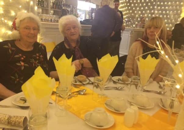 June Marriott and Jean Sanderson from Spalding with volunteer driver Sharon Beehoo at a Christmas party in Skegness. ANL-161216-110255001
