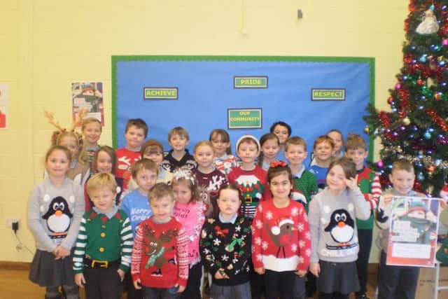 Pupils at Sutton on Sea Primary marked national Christmas jumper day.