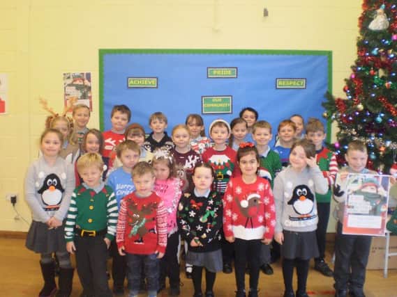 Pupils at Sutton on Sea Primary marked national Christmas jumper day.