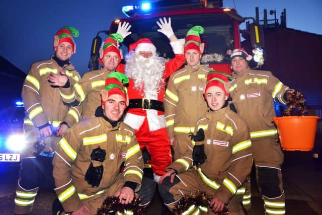 Santa run from Kirton fire station
Santa and firemen elves ready to set-off from the Station St fire station ANL-161221-161517001