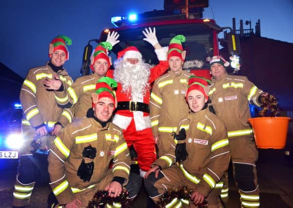 Santa run from Kirton fire station
Santa and firemen elves ready to set-off from the Station St fire station ANL-161221-161517001