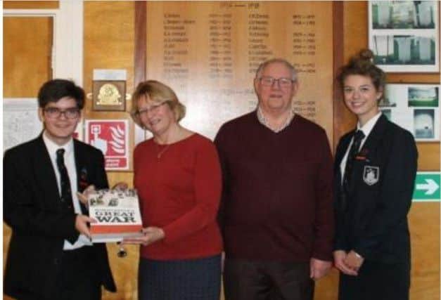 Colin Gascoyne & Mary Silverton, authors of the book, Horncastle's Great War- were pleased to present a copy to Phoebe Merritt and Gui Freitas, head boy and head girl of Queen Elizabeth Grammar School.