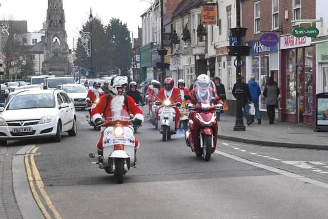 Members of Sleaford All-Knighters scooter club delivering donated mince pies, rum truffles and sherry to Roxholm Care Home. EMN-161219-110909001