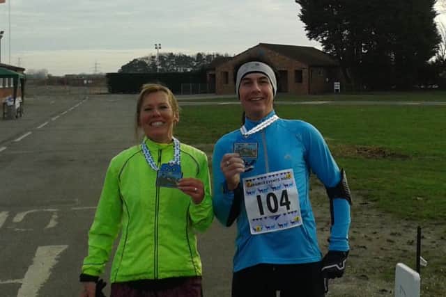 Carl and Lisa at the Skegness Santa Fun Run EMN-161219-120139002