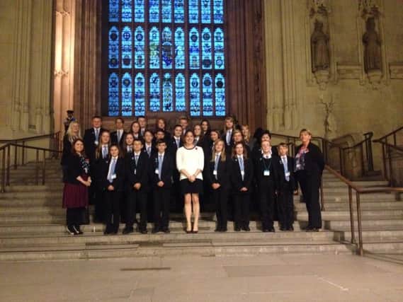 Somercotes Academy pupils pictured with MP for Louth and Horncastle, Victoria Atkins.