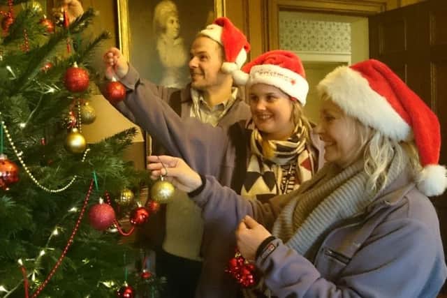 Gunby Staff decorating: Nigel Hodges, Rachel Marriott and Roni Sellers
