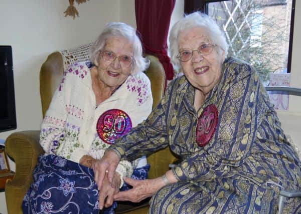 Twins Sheila Taylor and Barbara Cooke who celebrated their 90th birthday.