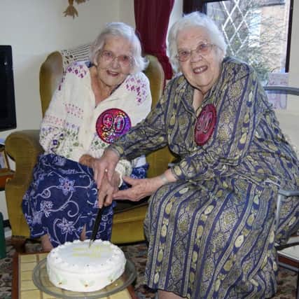 Twins Sheila Taylor and Barbara Cooke who celebrated their 90th birthday.
