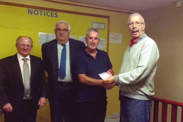 Chairman of Middle Rasen Village Hall, Peter Dawson received the cheque from Bayons Lodge of Freemasons EMN-161222-162856001