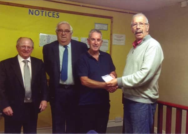 Chairman of Middle Rasen Village Hall, Peter Dawson received the cheque from Bayons Lodge of Freemasons EMN-161222-162856001