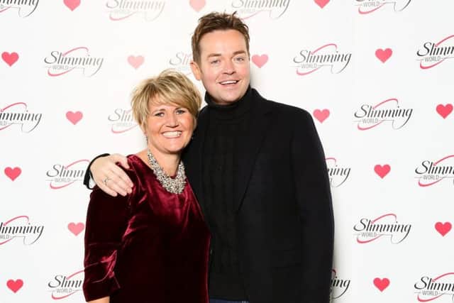 Slimming World manager Melanie Lea with TV presenter Stephen Mulhern. EMN-161230-134524001
