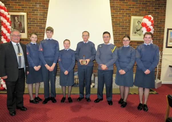 Cranwell RAFA chairman Tony Crossman with Flt Lt Dave Peacock and Sleaford Air Cadets at the torch presentation. EMN-161222-140409001