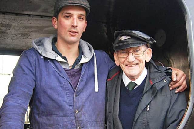 Tom Jones (23) from Alford with his grandfather Tony Jones, one of the leading lights in the formation of the heritage line.