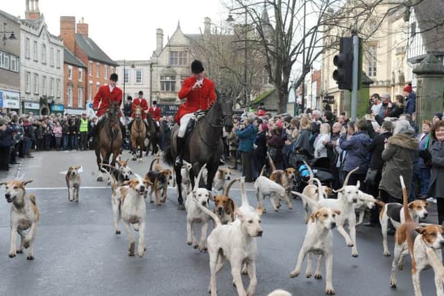Blankney Hunt meet in Sleaford Market PLace. Riding out of the market place. EMN-161223-142843001