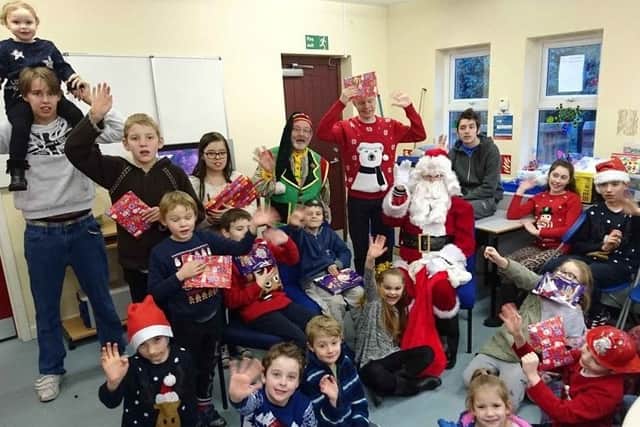Sleaford and District Lions join Rainbow Flyers at Ruskington for their Christmas party. EMN-161228-123406001