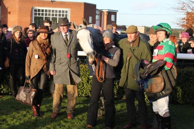 Connections of Brigg-trained Gonalston Cloud celebrate after his win in the Clugston Lincolnshire National. Picture: Peter Thompson EMN-161227-101427002