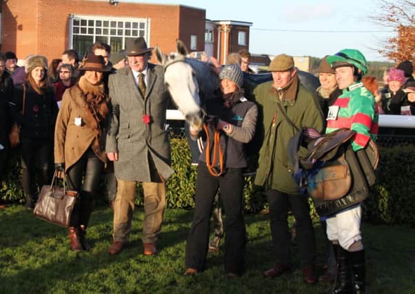 Connections of Brigg-trained Gonalston Cloud celebrate after his win in the Clugston Lincolnshire National. Picture: Peter Thompson EMN-161227-101427002