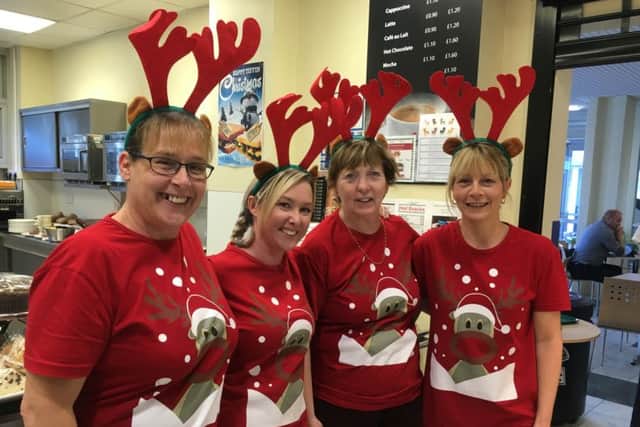 Staff working in the pantry at Bostons Pilgrim Hospital are dressing up to raise funds for Butterfly Hospice Trust. EMN-161220-093424001 EMN-161220-093424001