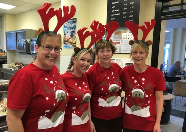 Staff working in the pantry at Bostons Pilgrim Hospital are dressing up to raise funds for Butterfly Hospice Trust. EMN-161220-093424001 EMN-161220-093424001