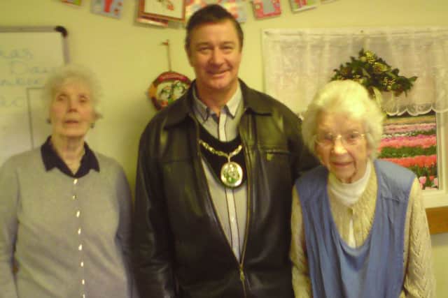 Mayor John Matthews with two residents of The Poplars Care Home, which he visited on Christmas Day EMN-161226-085948001