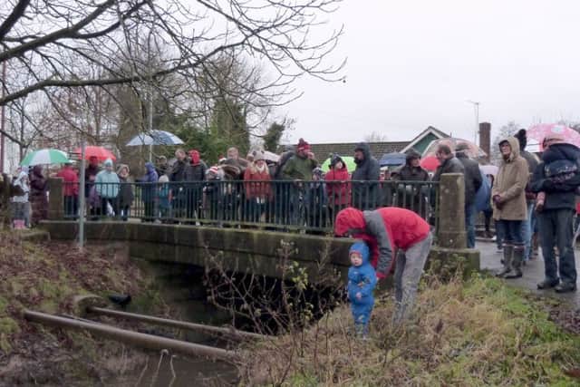 Waiting on Parry's Bridge for the start of the 2017 duck race EMN-170201-184350001