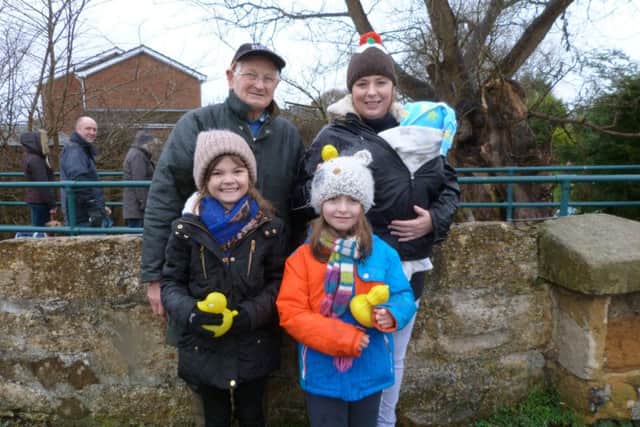 Sophie Norton and Jessica Bewley with Alan Pennell and Sarah Wilds holding Oliver Nash. EMN-170201-185143001