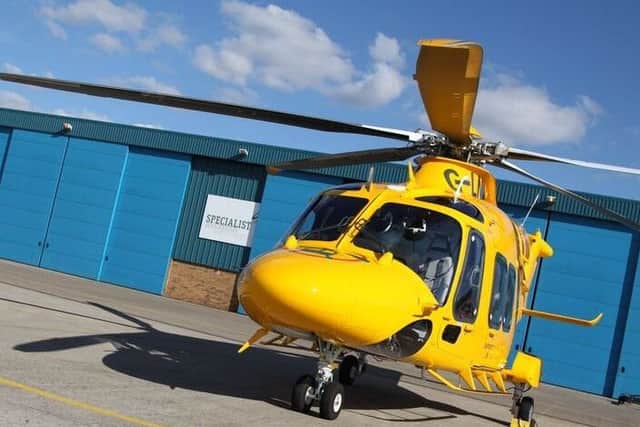 The new air ambulance, all painted up with logos. EMN-161228-144209001 EMN-161228-144209001