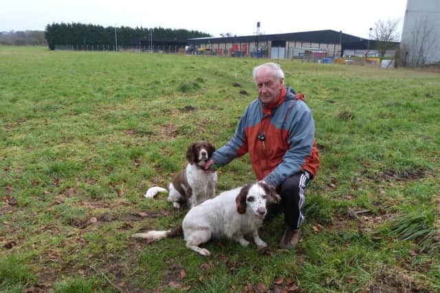 Clive Rudd with his dogs George and Pippa EMN-170601-214139001
