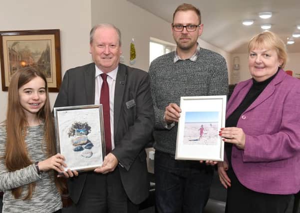 SECWHA photo competition winners. L-R Abigail Crowe, Bill Hutchinson - chairman of SECWHA, Tom Wyles and June Howard - business manager. ANL-170601-153015001