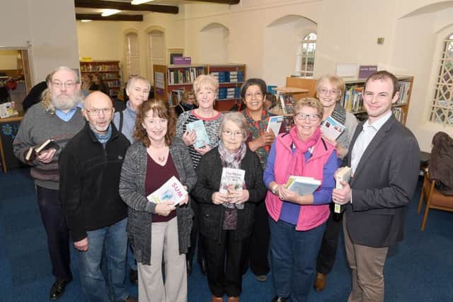 Matt Warman MP (right) at the opening of the new Wainfleet Library with volunteers (from left) David Potter, Neil Clayton, Gill Simpson, Chris Ramsdale - volunteer co-ordinator, Wendy Bottomley, Audrey Murgatroyd, Christine Onyemah, Hazel Sturgess and Jan Sweetland. Photo: MSKP-030117-30. ANL-170601-154836001