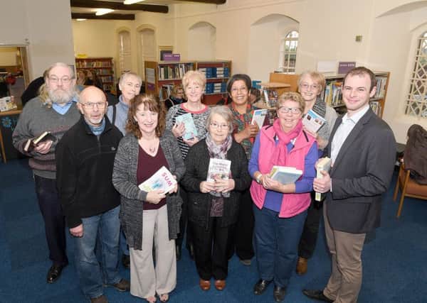 Matt Warman MP (right) at the opening of the new Wainfleet Library with  volunteers (from left) David Potter, Neil Clayton, Gill Simpson, Chris Ramsdale - volunteer co-ordinator, Wendy Bottomley, Audrey Murgatroyd, Christine Onyemah, Hazel Sturgess and Jan Sweetland. Photo: MSKP-030117-30. ANL-170601-154836001