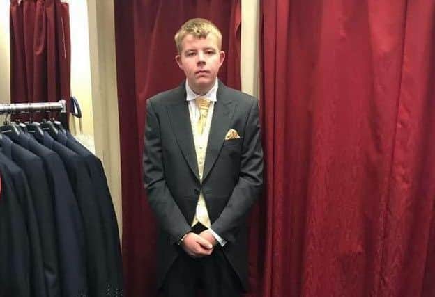 Jack Mellors gets into the suit he would wear as Best Man at his brother's wedding. ANL-161229-135552001