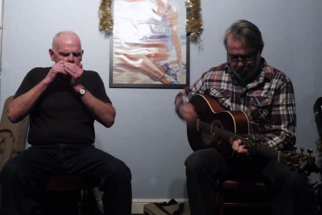 Barry Forbes and John Hubbert will play a mix of authentic blues and their own music. EMN-170201-140053001