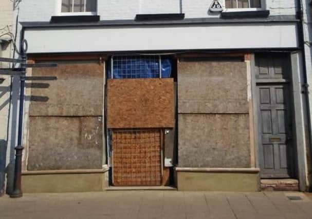 The owner of this property in Boston has been fined for failing to comply with a notice to renovate the building.