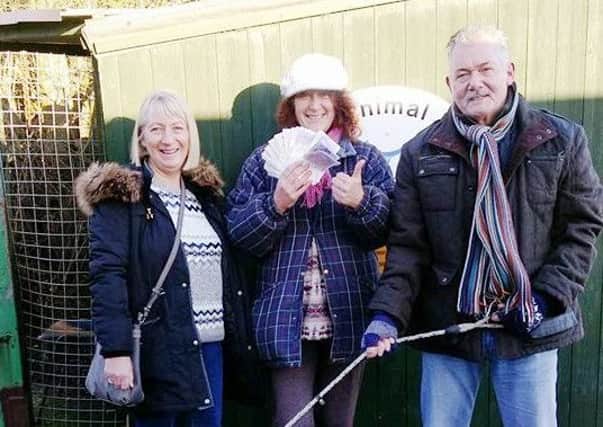 Sue Rice (centre) with Elaine and Charlie Fawn, who donated £1,000 raised from car boot sales over the past year.