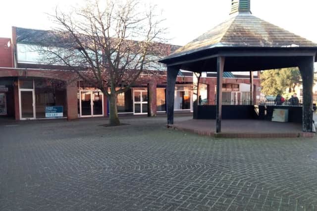 Sleaford's Riverside Precinct. The bandstand is set to go and this row of shops likely to be occupied by a large main street retailer. EMN-170601-143910001