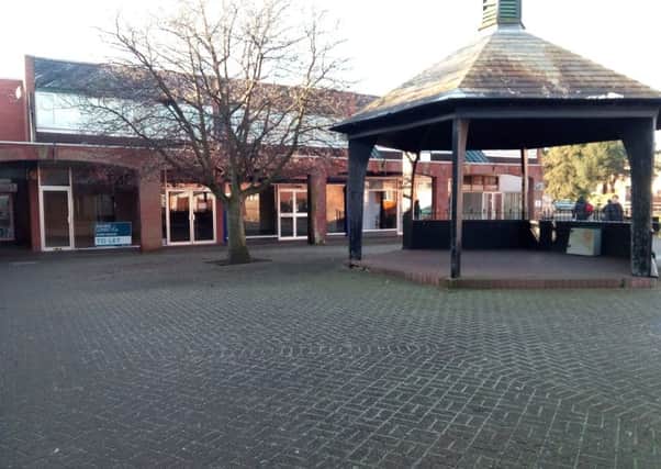 Sleaford's Riverside Precinct. The bandstand is set to go and this row of shops likely to be occupied by a large main street retailer. EMN-170601-143910001