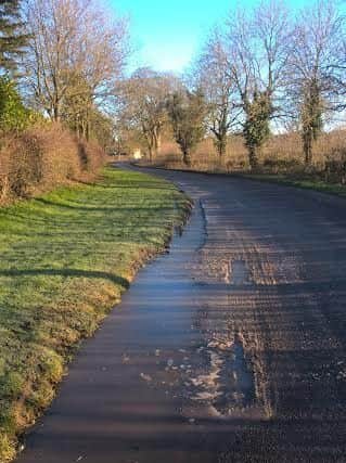 Main Road in Belchford where water-filled pot-holes are often a hidden danger to drivers.