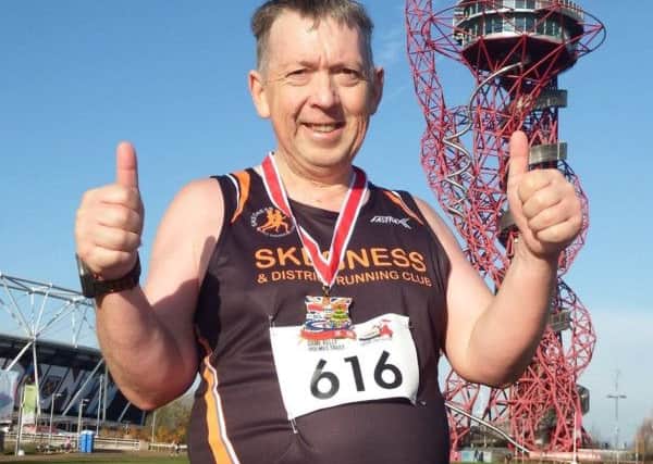 Thumbs up: Horncastle runner Robin Harrison who is hard at work preparing for the London Marathon.
