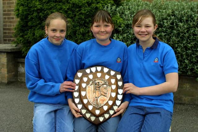 The Guides with their trophy.