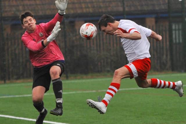 Skegness Town skipper Ben Davison was inches wide with this header to the relief of Spilsby keeper Adam Marsh.