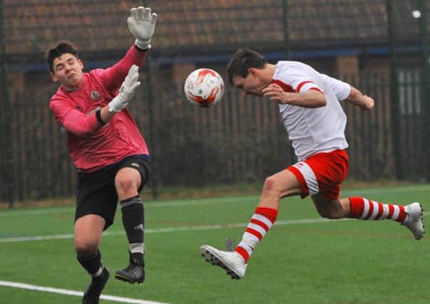 Skegness Town skipper Ben Davison was inches wide with this header to the relief of Spilsby keeper Adam Marsh.